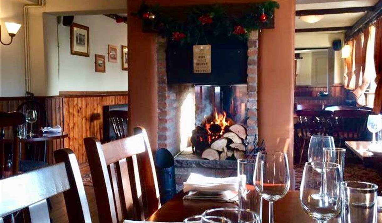 Sit by the fire at The Drover's Arms
